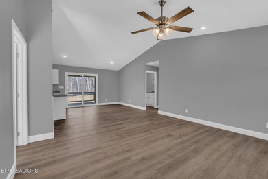 Experience the perfect blend of modern comfort and lakeside on Lake Tansi Village Country Club in Tennessee - for sale on GolfHomes.com, golf home, golf lot