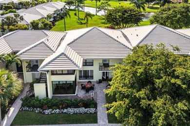 Enjoy picturesque views of the lush golf course and serene on Quail Ridge Golf Course and Country Club in Florida - for sale on GolfHomes.com, golf home, golf lot