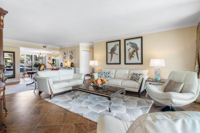 Enjoy picturesque views of the lush golf course and serene on Quail Ridge Golf Course and Country Club in Florida - for sale on GolfHomes.com, golf home, golf lot