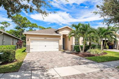 Low HOA Fees in the Quaint Gated Community of Canopy Cove This on  in Florida - for sale on GolfHomes.com, golf home, golf lot