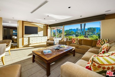 An Artful Masterpiece on the Fairway 13th hole. Discover a rare on Desert Island Golf and Country Club in California - for sale on GolfHomes.com, golf home, golf lot