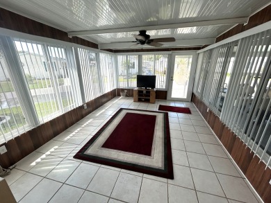 This home is located within a 55+ resort style leased land on Big Cypress Golf and Country Club in Florida - for sale on GolfHomes.com, golf home, golf lot