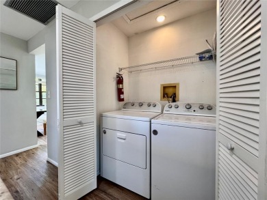 WELCOME to this bright and spacious villa located in the HIGHLY on East Lake Woodlands Country Club in Florida - for sale on GolfHomes.com, golf home, golf lot