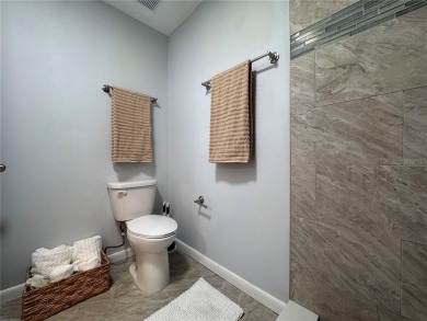 WELCOME to this bright and spacious villa located in the HIGHLY on East Lake Woodlands Country Club in Florida - for sale on GolfHomes.com, golf home, golf lot