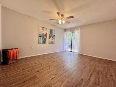 WELCOME to this bright and spacious villa located in the HIGHLY on East Lake Woodlands Country Club in Florida - for sale on GolfHomes.com, golf home, golf lot