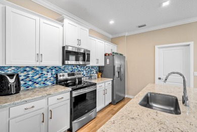 Low HOA Fees in the Quaint Gated Community of Canopy Cove This on  in Florida - for sale on GolfHomes.com, golf home, golf lot