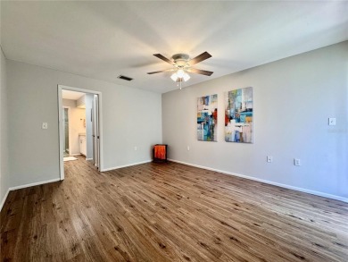 WELCOME to this bright and spacious villa located in the HIGHLY on East Lake Woodlands Country Club in Florida - for sale on GolfHomes.com, golf home, golf lot