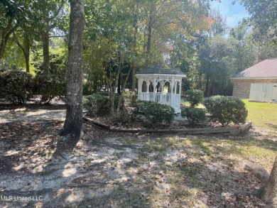 LARGE CLEARED LOT WITH GOLF COURSE VIEWS READY TO BUILD on Diamondhead Country Club in Mississippi - for sale on GolfHomes.com, golf home, golf lot