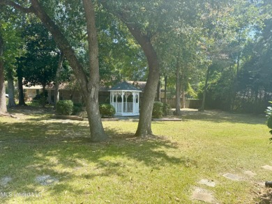 LARGE CLEARED LOT WITH GOLF COURSE VIEWS READY TO BUILD on Diamondhead Country Club in Mississippi - for sale on GolfHomes.com, golf home, golf lot