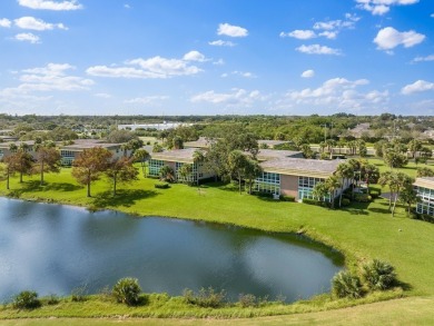 Washer  Dryer in unit!Panoramic water  golf course views this on Vero Beach South Golf Course in Florida - for sale on GolfHomes.com, golf home, golf lot