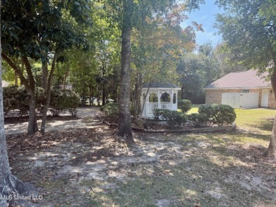 LARGE CLEARED LOT WITH GOLF COURSE VIEWS READY TO BUILD on Diamondhead Country Club in Mississippi - for sale on GolfHomes.com, golf home, golf lot