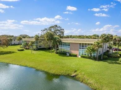 Washer  Dryer in unit!Panoramic water  golf course views this on Vero Beach South Golf Course in Florida - for sale on GolfHomes.com, golf home, golf lot