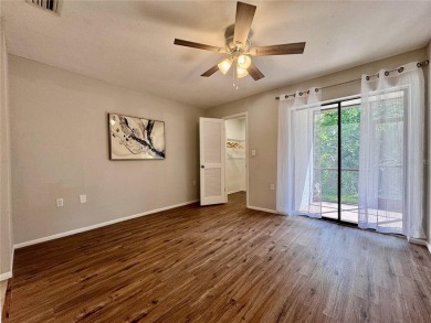 WELCOME to this bright and spacious villa located in the HIGHLY on East Lake Woodlands Country Club in Florida - for sale on GolfHomes.com, golf home, golf lot