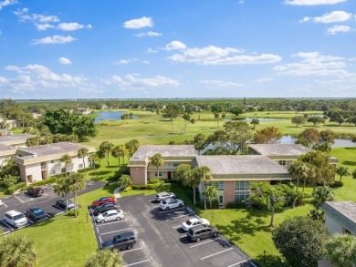 Washer  Dryer in unit!Panoramic water  golf course views this on Vero Beach South Golf Course in Florida - for sale on GolfHomes.com, golf home, golf lot