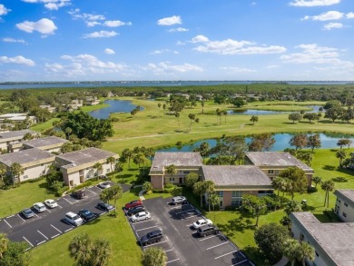 Washer  Dryer in unit!Panoramic water  golf course views this on Vero Beach South Golf Course in Florida - for sale on GolfHomes.com, golf home, golf lot