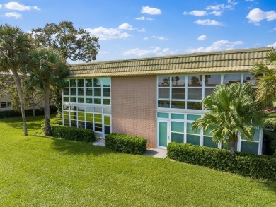 Washer  Dryer in unit!Panoramic water  golf course views this on Vero Beach South Golf Course in Florida - for sale on GolfHomes.com, golf home, golf lot