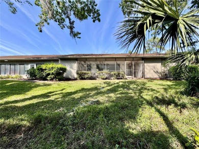 WELCOME to this bright and spacious villa located in the HIGHLY on East Lake Woodlands Country Club in Florida - for sale on GolfHomes.com, golf home, golf lot