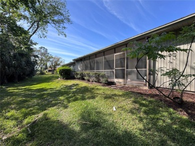 WELCOME to this bright and spacious villa located in the HIGHLY on East Lake Woodlands Country Club in Florida - for sale on GolfHomes.com, golf home, golf lot