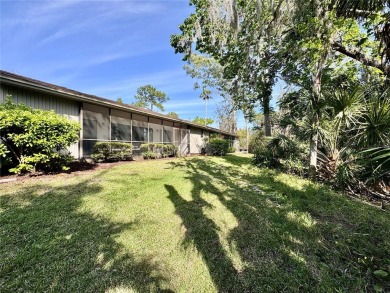 WELCOME to this bright and spacious villa located in the HIGHLY on East Lake Woodlands Country Club in Florida - for sale on GolfHomes.com, golf home, golf lot