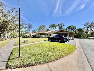 WELCOME to this bright and spacious villa located in the HIGHLY on East Lake Woodlands Country Club in Florida - for sale on GolfHomes.com, golf home, golf lot