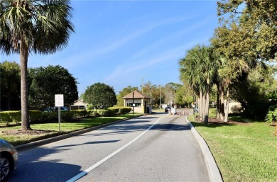 WELCOME to this bright and spacious villa located in the HIGHLY on East Lake Woodlands Country Club in Florida - for sale on GolfHomes.com, golf home, golf lot