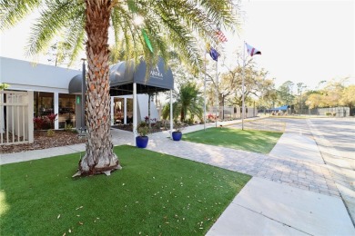 WELCOME to this bright and spacious villa located in the HIGHLY on East Lake Woodlands Country Club in Florida - for sale on GolfHomes.com, golf home, golf lot