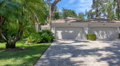 Serene, easy-living villa with treed views in the prestigious on The Meadows Golf and Country Club in Florida - for sale on GolfHomes.com, golf home, golf lot