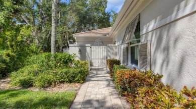 Serene, easy-living villa with treed views in the prestigious on The Meadows Golf and Country Club in Florida - for sale on GolfHomes.com, golf home, golf lot