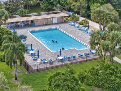 First-floor, fully renovated lakefront residence designed for on Wynmoor Golf Course in Florida - for sale on GolfHomes.com, golf home, golf lot