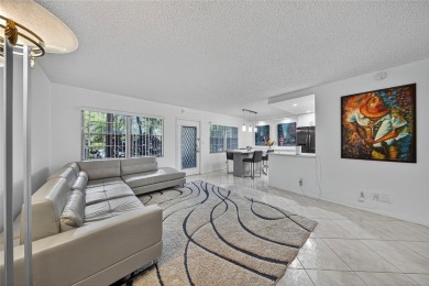 FIRST FLOOR -- COMPLETELY RENOVATED LAKEFRONT HOME that will on Wynmoor Golf Course in Florida - for sale on GolfHomes.com, golf home, golf lot