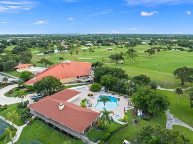 Rarely available 2-bedroom, 2-bathroom first-floor corner unit on Meadowood Golf and Tennis Club in Florida - for sale on GolfHomes.com, golf home, golf lot