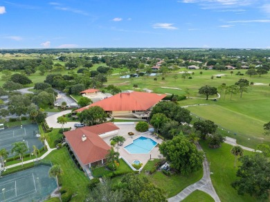 Rarely available 2-bedroom, 2-bathroom first-floor corner unit on Meadowood Golf and Tennis Club in Florida - for sale on GolfHomes.com, golf home, golf lot