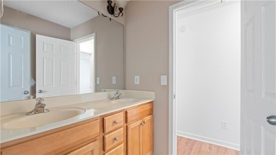 Discover this beautifully maintained 5-bedroom, 3.5 bath home on Summergrove Golf Club in Georgia - for sale on GolfHomes.com, golf home, golf lot