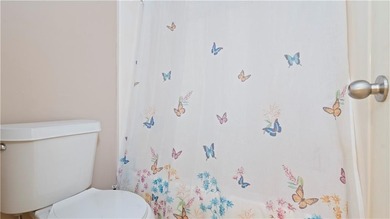 Discover this beautifully maintained 5-bedroom, 3.5 bath home on Summergrove Golf Club in Georgia - for sale on GolfHomes.com, golf home, golf lot