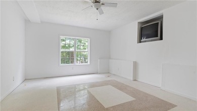 Discover this beautifully maintained 5-bedroom, 3.5 bath home on Summergrove Golf Club in Georgia - for sale on GolfHomes.com, golf home, golf lot