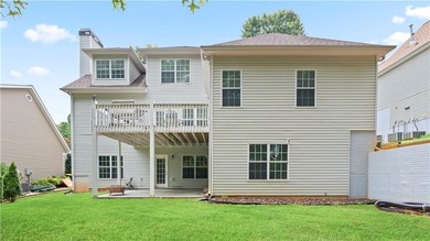 Discover this beautifully maintained 5-bedroom, 3.5 bath home on Summergrove Golf Club in Georgia - for sale on GolfHomes.com, golf home, golf lot