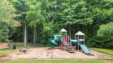 Discover this beautifully maintained 5-bedroom, 3.5 bath home on Summergrove Golf Club in Georgia - for sale on GolfHomes.com, golf home, golf lot