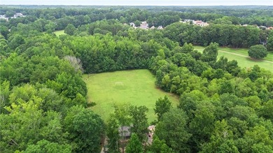 Discover this beautifully maintained 5-bedroom, 3.5 bath home on Summergrove Golf Club in Georgia - for sale on GolfHomes.com, golf home, golf lot