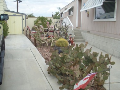 This 1973 140 sq ft. Manufactured home is a 2-bedroom 2 bath on The Club At Shenandoah Springs in California - for sale on GolfHomes.com, golf home, golf lot