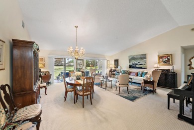 This charming home is perfectly situated on an oversized golf on Riverbend Golf Club in Florida - for sale on GolfHomes.com, golf home, golf lot
