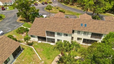 Welcome to your serene second-floor retreat in the heart of on Heather Golf and Country Club in Florida - for sale on GolfHomes.com, golf home, golf lot