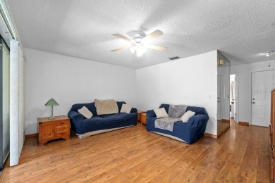 Welcome to your serene second-floor retreat in the heart of on Heather Golf and Country Club in Florida - for sale on GolfHomes.com, golf home, golf lot