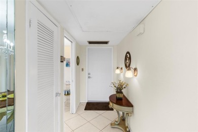 Step into this lower penthouse condo where vintage charm meets on Palm-Aire Country Club and Resort - Palms in Florida - for sale on GolfHomes.com, golf home, golf lot