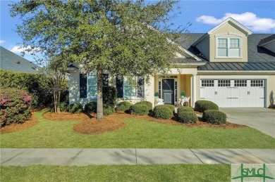 Enjoy maintenance-free living in the heart of Savannah Quarters on Savannah Quarters Country Club in Georgia - for sale on GolfHomes.com, golf home, golf lot