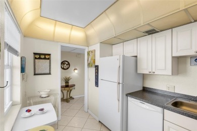 Step into this lower penthouse condo where vintage charm meets on Palm-Aire Country Club and Resort - Palms in Florida - for sale on GolfHomes.com, golf home, golf lot