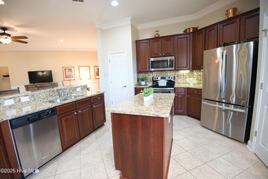 Welcome home to easy, Resort-style living in the Meadowlands on Meadowlands Golf Club in North Carolina - for sale on GolfHomes.com, golf home, golf lot