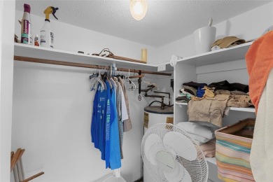 Step into this lower penthouse condo where vintage charm meets on Palm-Aire Country Club and Resort - Palms in Florida - for sale on GolfHomes.com, golf home, golf lot