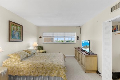 Step into this lower penthouse condo where vintage charm meets on Palm-Aire Country Club and Resort - Palms in Florida - for sale on GolfHomes.com, golf home, golf lot