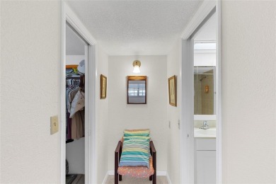 Step into this lower penthouse condo where vintage charm meets on Palm-Aire Country Club and Resort - Palms in Florida - for sale on GolfHomes.com, golf home, golf lot