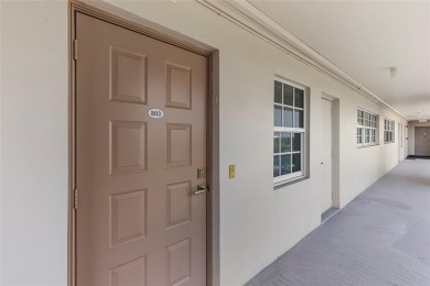 Step into this lower penthouse condo where vintage charm meets on Palm-Aire Country Club and Resort - Palms in Florida - for sale on GolfHomes.com, golf home, golf lot
